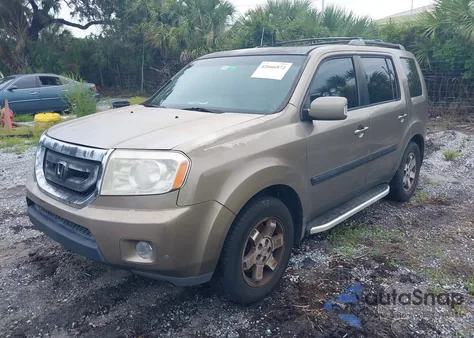 2011 Honda Pilot Touring из США, поврежденный, VIN 5FNYF3H94BB024764